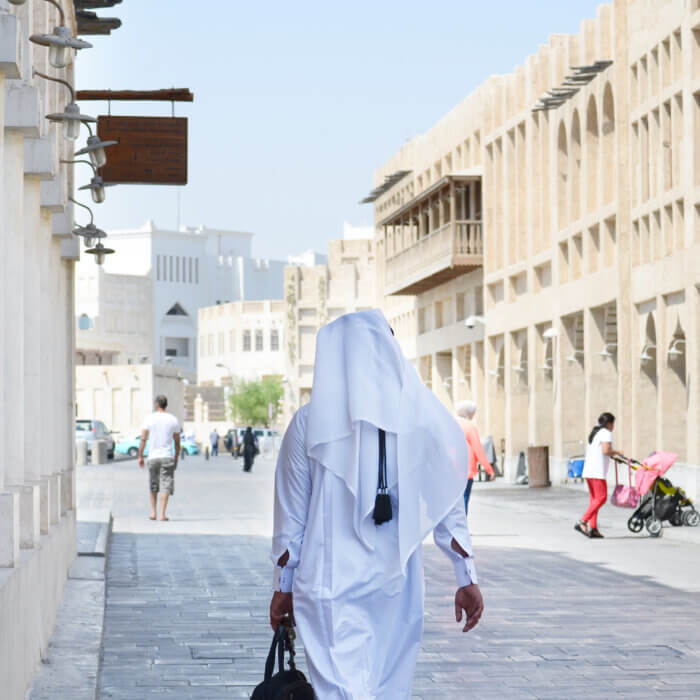 View of local man walking in Doha, Qatar