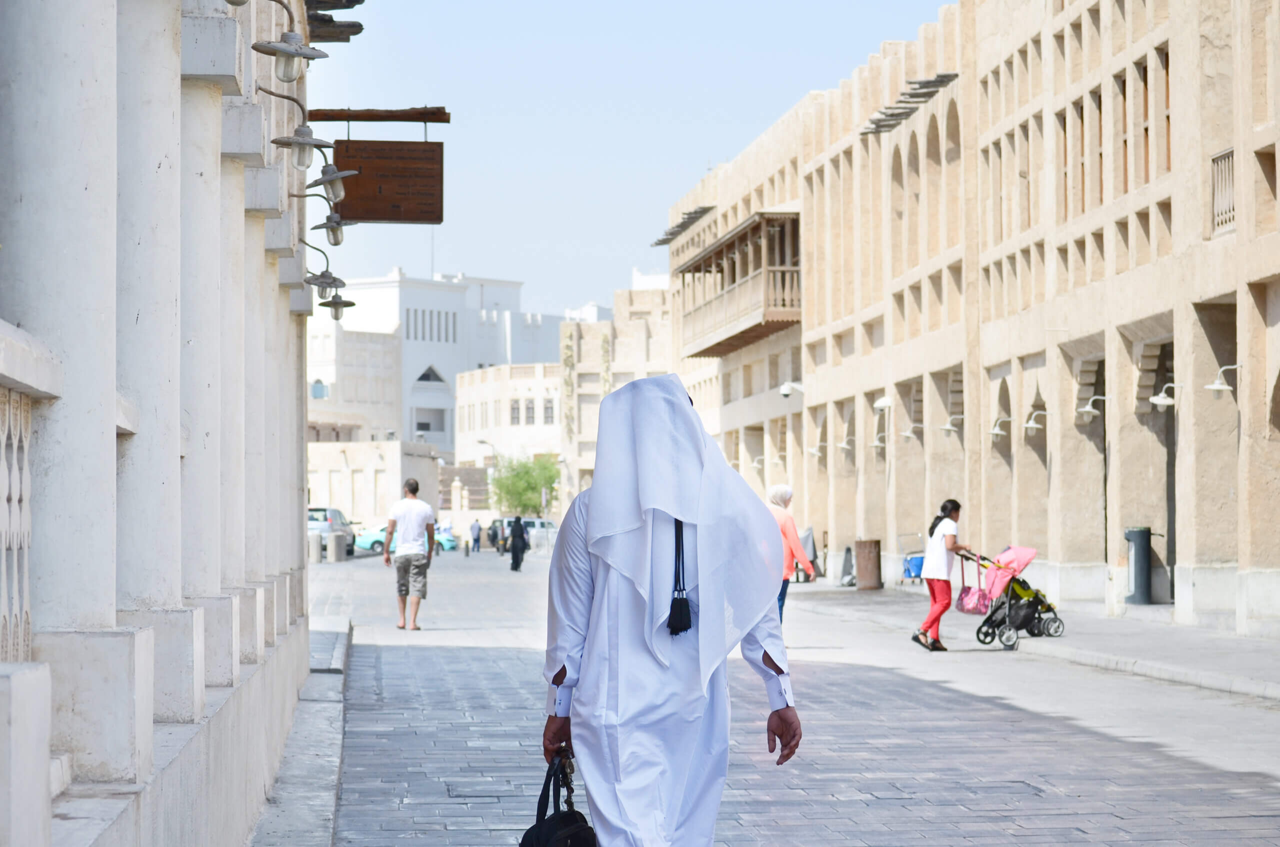 View of local man walking in Doha, Qatar