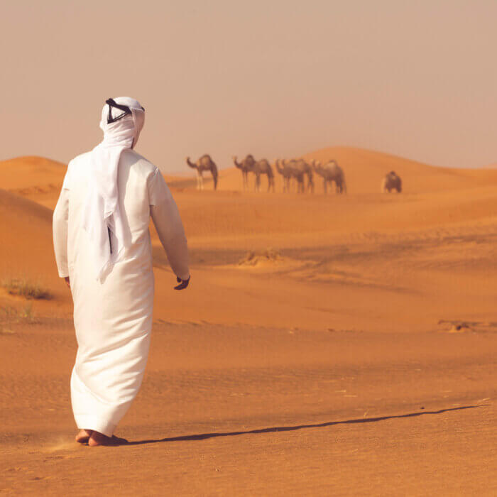 Saudi man in desert in Saudi Arabia